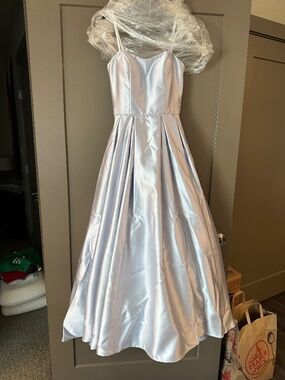 Cachet prom dress, size 4. White base with blue sparkly detailing and beaded acc
